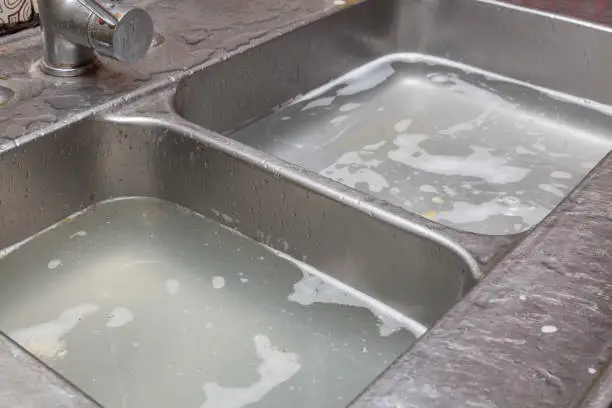 How to Unclog a Sink with Standing Water