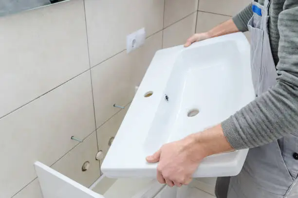 Replacing a 25 Year Old Sink for Plant City Dolphins Youth Football & Cheer Organization