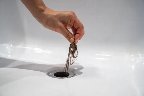 What Dissolves Hair in Clogged Drains