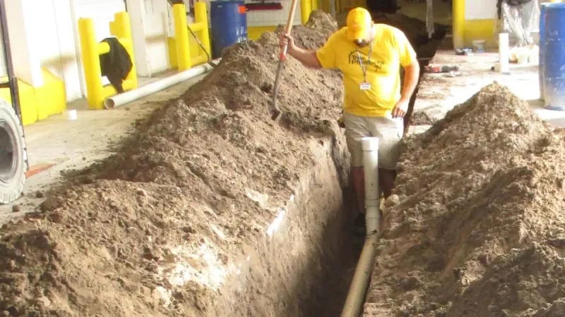 Slab leak detection on a Lakeland home, where water washes voids into the sand under the foundation